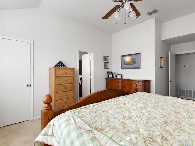 bedroom with lofted ceiling, light carpet, and ceiling fan