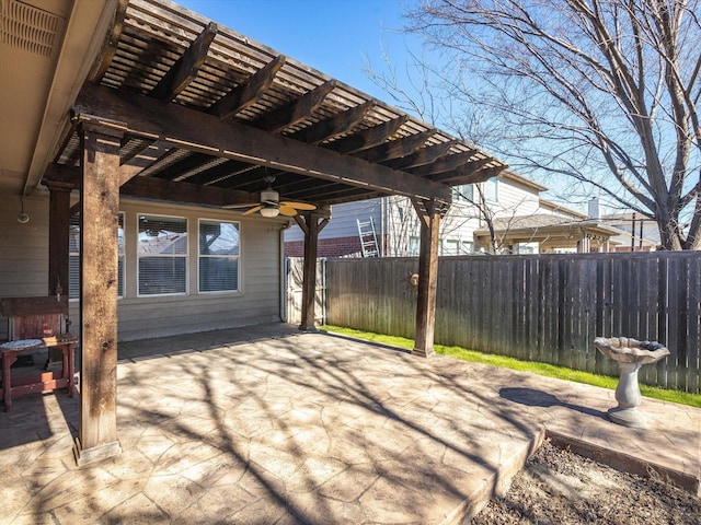 view of patio / terrace with ceiling fan and a pergola