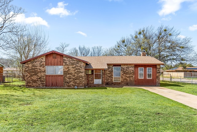 ranch-style home with a front yard