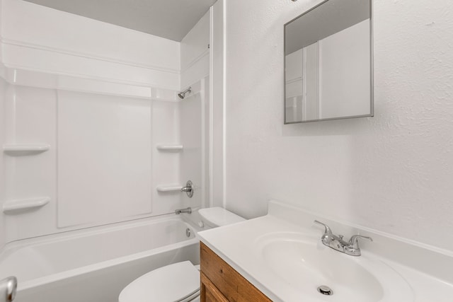 full bathroom with  shower combination, toilet, and vanity