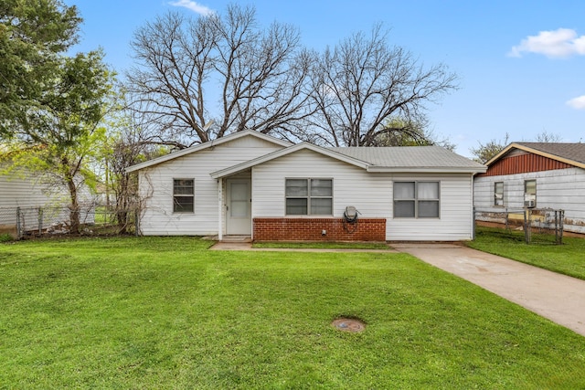 view of front of home with a front yard