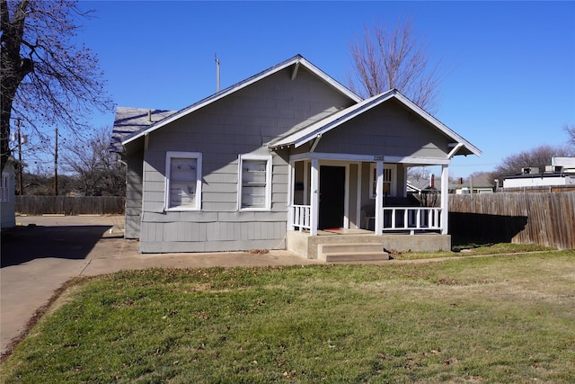 1208 Kemp Blvd, Wichita Falls, TX 76309 - bungalow with a front yard and a porch