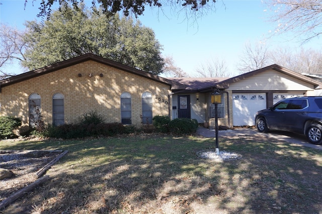 single story home with a garage and a front yard