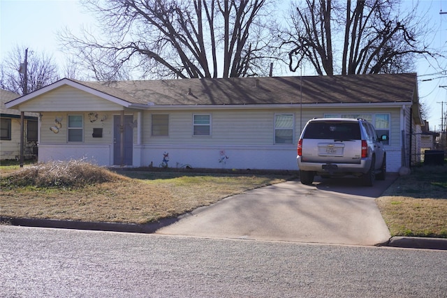 single story home featuring a garage