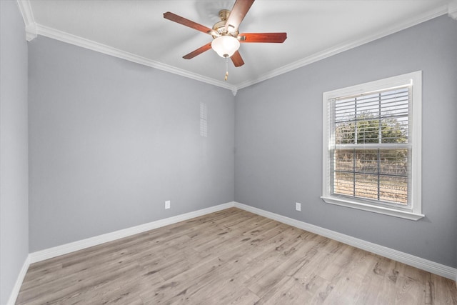 unfurnished room featuring light hardwood / wood-style flooring, ornamental molding, and ceiling fan