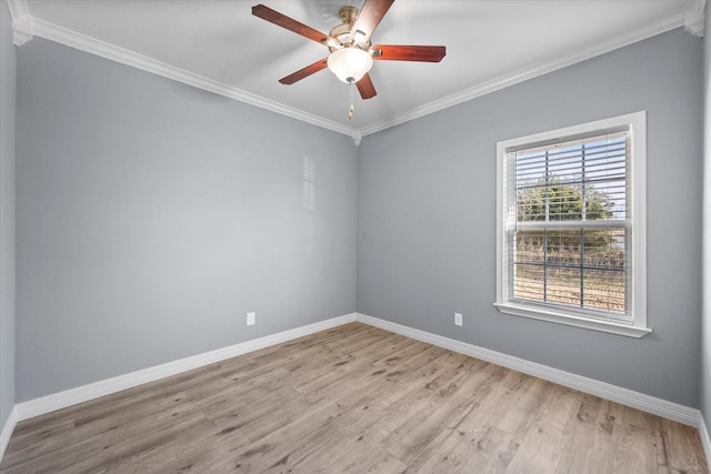 empty room with crown molding, ceiling fan, and light hardwood / wood-style floors