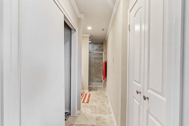 corridor featuring ornamental molding