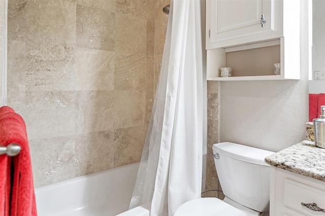 full bathroom featuring vanity, shower / tub combo with curtain, and toilet