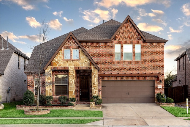 english style home with a garage