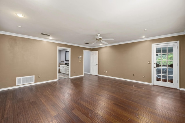 spare room featuring dark hardwood / wood-style flooring, crown molding, and ceiling fan