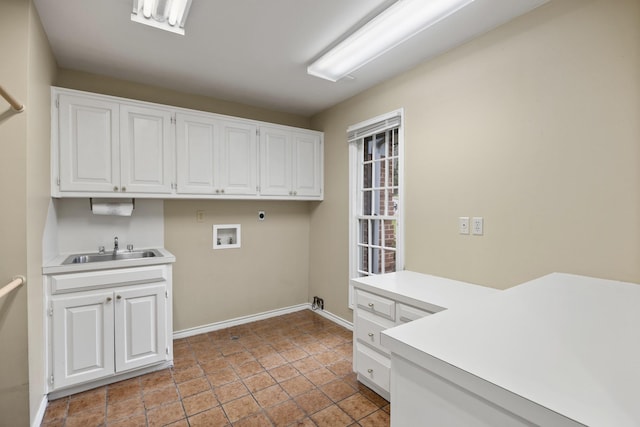 laundry room featuring cabinets, hookup for an electric dryer, sink, and washer hookup