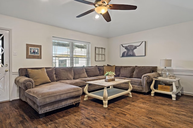 living room with ceiling fan and dark hardwood / wood-style floors