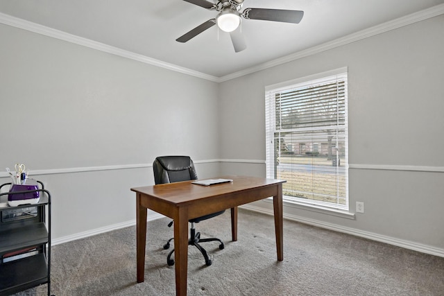 carpeted home office featuring ceiling fan and ornamental molding