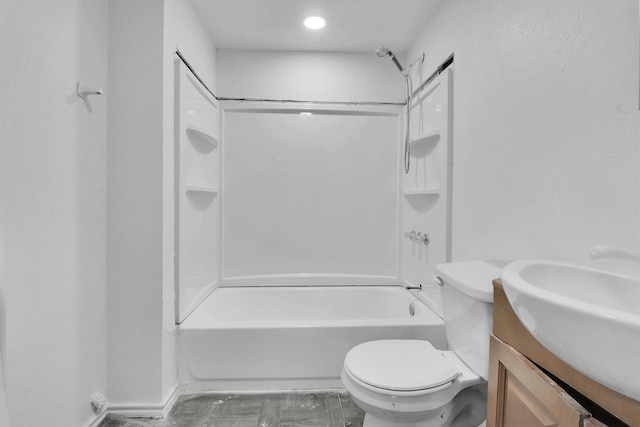 full bathroom with vanity,  shower combination, and toilet