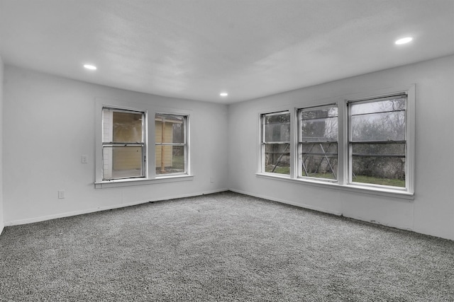 view of carpeted spare room