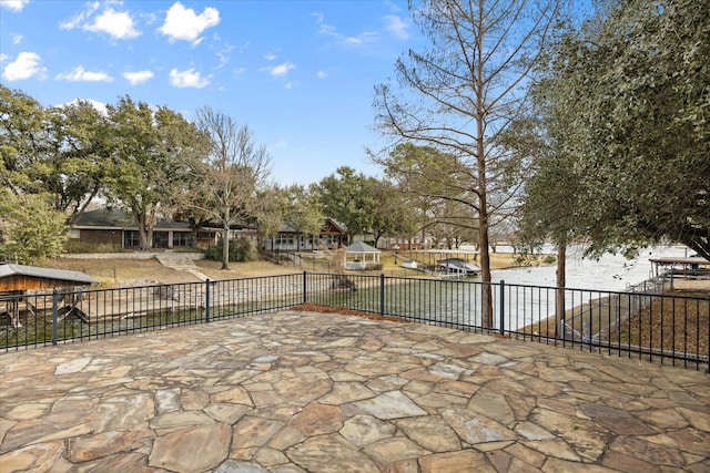 view of patio / terrace with a water view