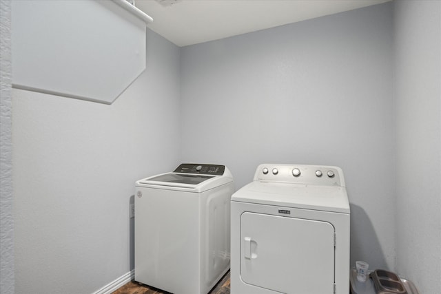 washroom with washer and clothes dryer