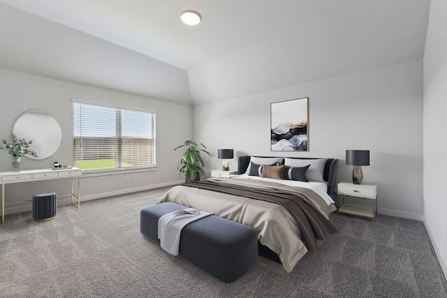 bedroom with vaulted ceiling and carpet flooring