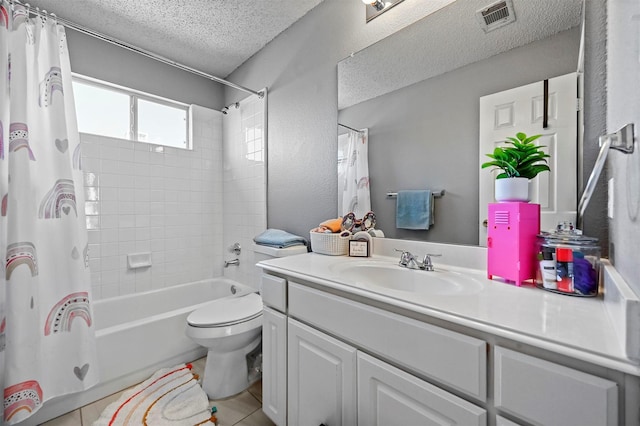 full bathroom with toilet, a textured ceiling, vanity, shower / bath combination with curtain, and tile patterned flooring