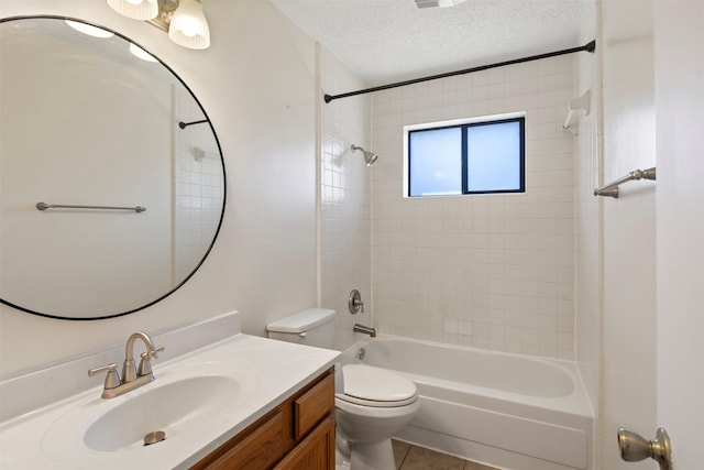 full bathroom with vanity, toilet, tub / shower combination, tile patterned floors, and a textured ceiling