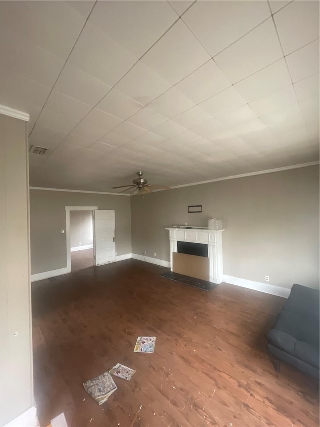 unfurnished living room featuring hardwood / wood-style flooring, ceiling fan, and ornamental molding