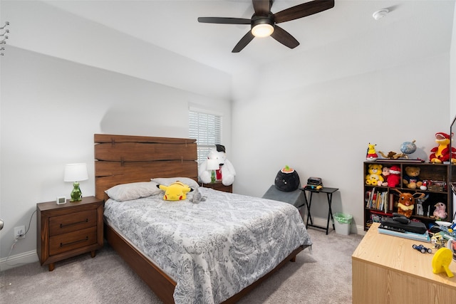 bedroom with light carpet and ceiling fan