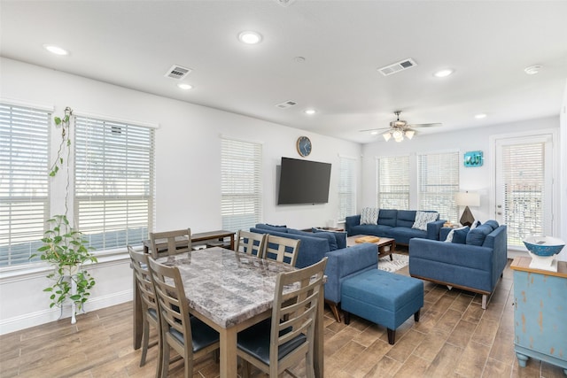 dining space with ceiling fan