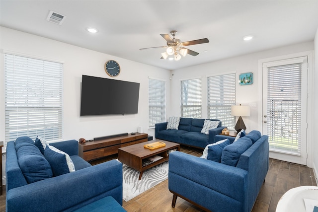 living room featuring ceiling fan