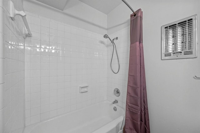 bathroom with shower / bath combination with curtain