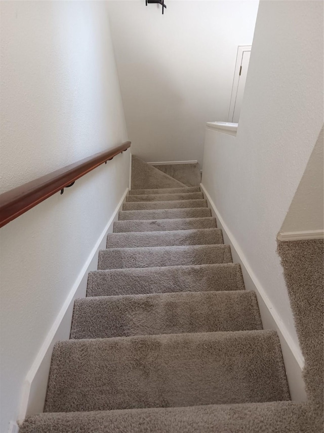 330 W Harwood Rd Unit C, Hurst, TX 76054 - staircase featuring carpet