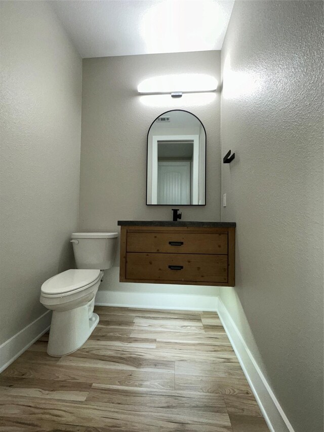 interior space featuring hardwood / wood-style flooring and a wealth of natural light