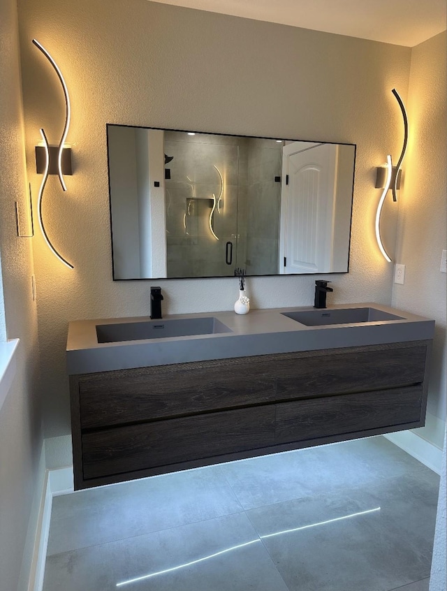 bathroom with vanity and walk in shower