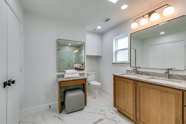 bathroom with vanity, toilet, and an enclosed shower