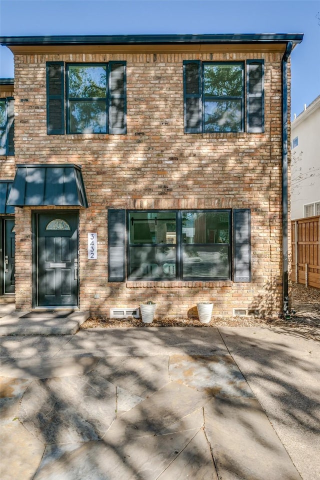 rear view of house with a patio area