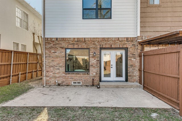 doorway to property featuring a patio area and french doors