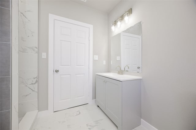 bathroom featuring vanity and a shower