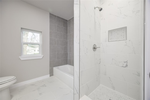 bathroom featuring shower with separate bathtub and toilet