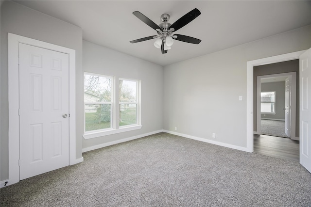 unfurnished bedroom with carpet floors and ceiling fan