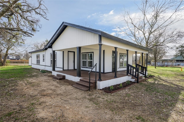 view of front of property featuring covered porch