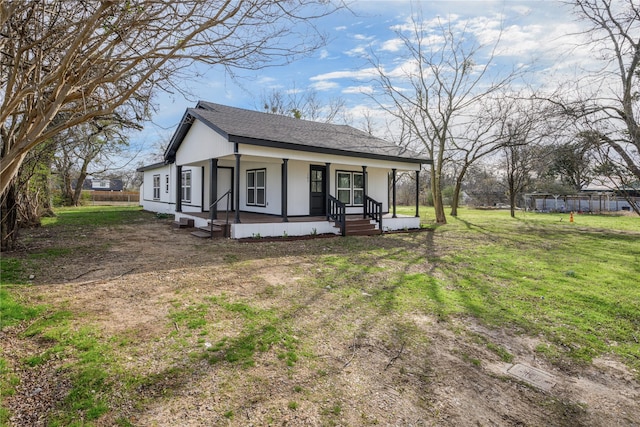 view of front of house featuring a porch and a front lawn