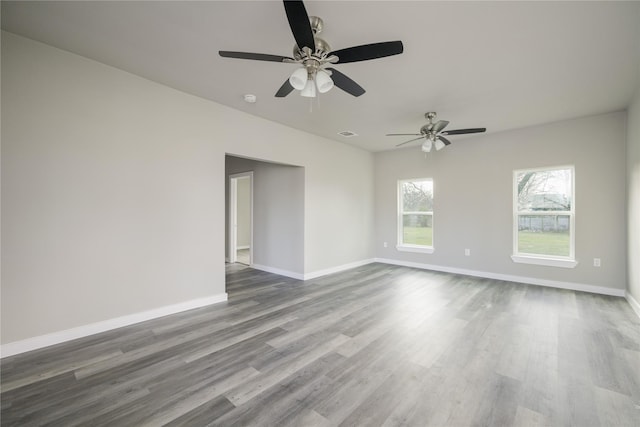 spare room with dark hardwood / wood-style floors