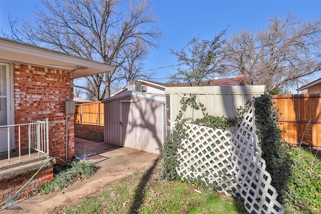 120 N 15th Ave, Munday, TX 76371 - view of yard featuring a storage shed