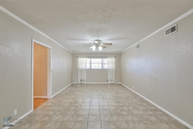 120 N 15th Ave, Munday, TX 76371 - spare room featuring ornamental molding, light tile patterned floors, and ceiling fan