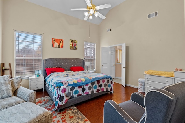 bedroom featuring dark wood-type flooring, ceiling fan, and lofted ceiling