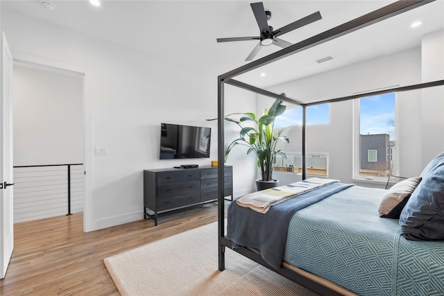 bedroom featuring ceiling fan and light wood-type flooring