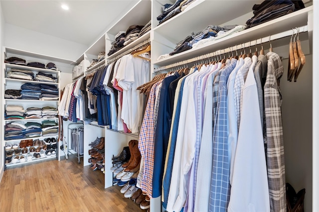 spacious closet featuring hardwood / wood-style flooring