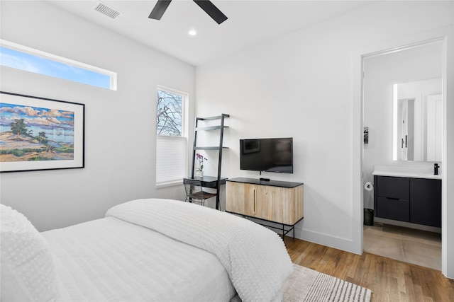 bedroom featuring light wood-type flooring and ceiling fan