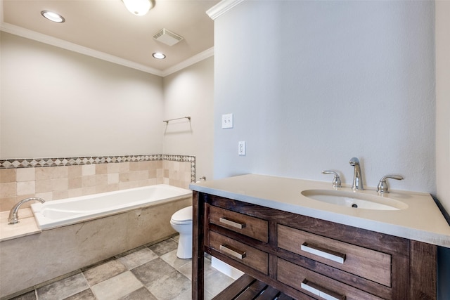 bathroom featuring vanity, tiled tub, crown molding, and toilet