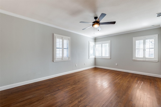 empty room with dark wood-type flooring, ceiling fan, and ornamental molding