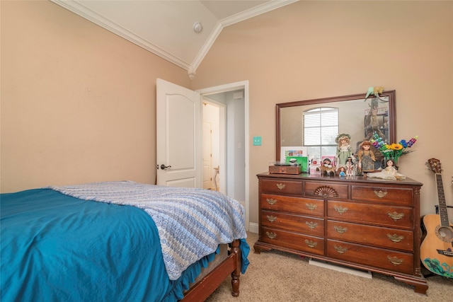 bedroom featuring vaulted ceiling, ornamental molding, and light carpet